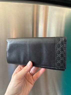 Gucci Black Leather Continental Wallet with Embossed GG Panel